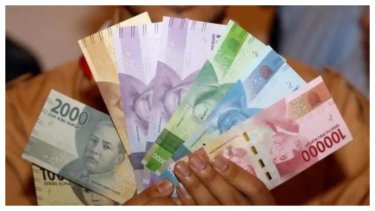 PENIPUAN LAMARAN PEKERJAAN - Ilustrasi uang kertas rupiah. 