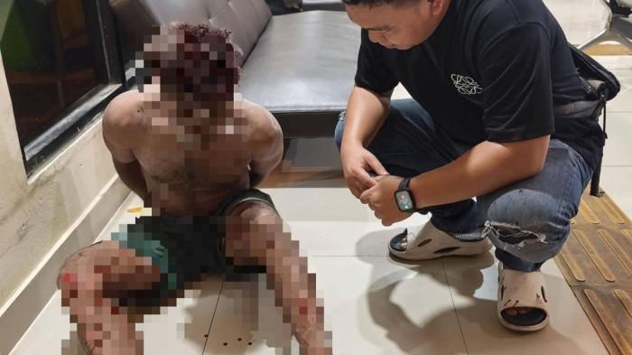 PELAKU - Foto pelaku yang mengamuk di Mantos saat diperiksa di ruang SPKT kantor Polresta Manado, Senin (15/6/2026). Pelaku diduga adalah ODGJ, pria tersebut menunjukkan perilaku yang tidak waras, ditanyai aparat, jawabannya ngelantur, alias tak terarah.