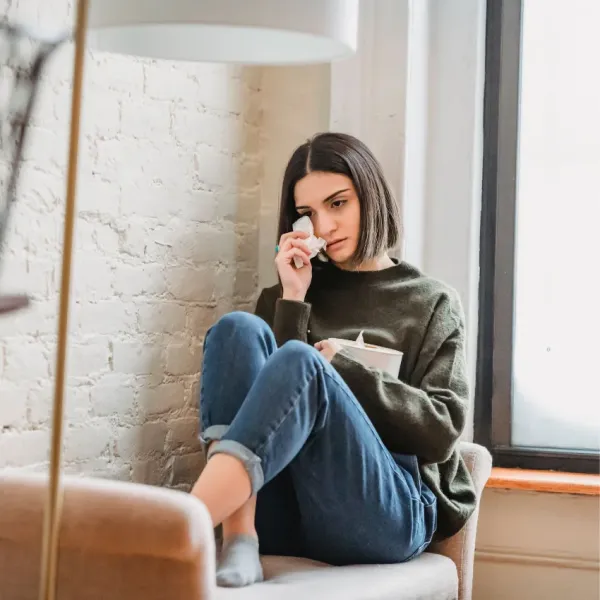 woman who feels homesick while at home