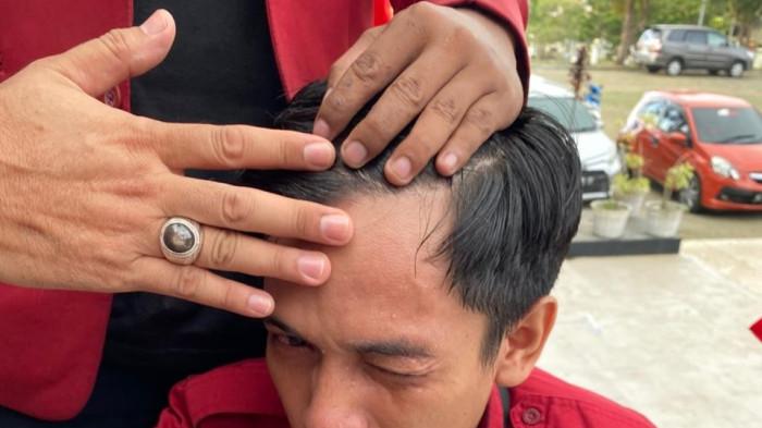 Ketua Umum Dewan Pimpinan Daerah Ikatan Mahasiswa Muhammadiyah Sulawesi Barat (DPD IMM Sulbar), Albar Syam diduga menjadi korban represif aparat kepolisian saat aksi demontrasi di Gedung DPRD Sulawesi barat, Selasa (23/6/2026) sore.