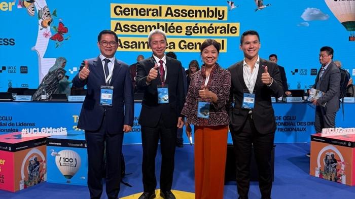 KONGRES - Bupati Minahasa Utara (Minut) Joune Ganda (paling kiri/busana setelan jas navy) mengikuti Kongres Dunia UCLG ASPAC di Maroko, Selasa 23 Juni 2026. Bupati ke-3 Minut ini berbicara tentang langkah perdamaian untuk antisipasi konflik.