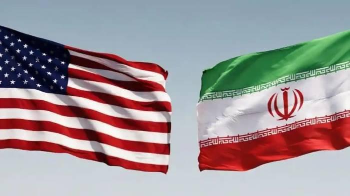 KESEPAKATAN - Ilustrasi bendera AS dan Iran. Iran dan Trump kini tengah beda pendapat terkait kesepakatan damai.