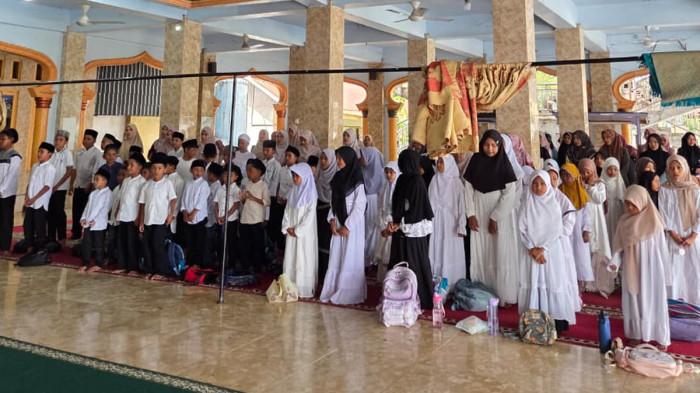 TPQ Raudhatul Qur’an Gelar Tasyakur Santri Kelas 6 dan Pembagian Rapor Semester Genap, Sabtu (27/6/2026).