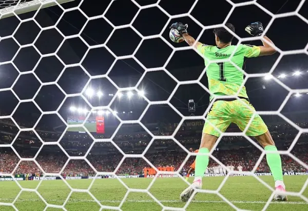 GUADALUPE, MEXICO - JUNE 29: (EDITOR'S NOTE: Image was captured using a remote camera from behind the goal.)Yassine Bounou #1 of Morocco saves the Netherlands' fifth penalty taken by Crysencio Summerville #24 of the Netherlands during the penalty shootout during the FIFA World Cup 2026 Round of 32 match between Netherlands and Morocco at Monterrey Stadium on June 29, 2026 in Guadalupe, Mexico. (Photo by Carl Recine/Getty Images)