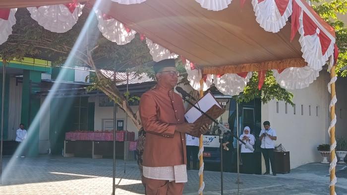 HARGANAS -- Sekda Provinsi Gorontalo Sofian Ibrahim saat membacakan amanat Mendukbangga pada peringatan Harganas ke-33 di Gorontalo, Senin (29/6/2026). Foto: TribunGorontalo.com/Jefri Potabuga