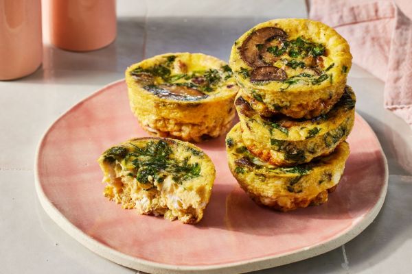 a recipe photo of the Sausage, Spinach & Mushroom Egg Bites Credit: Photographer: Jen Causey, Food Stylist: Jennifer Wendorf, Prop Stylist: Priscilla Montiel