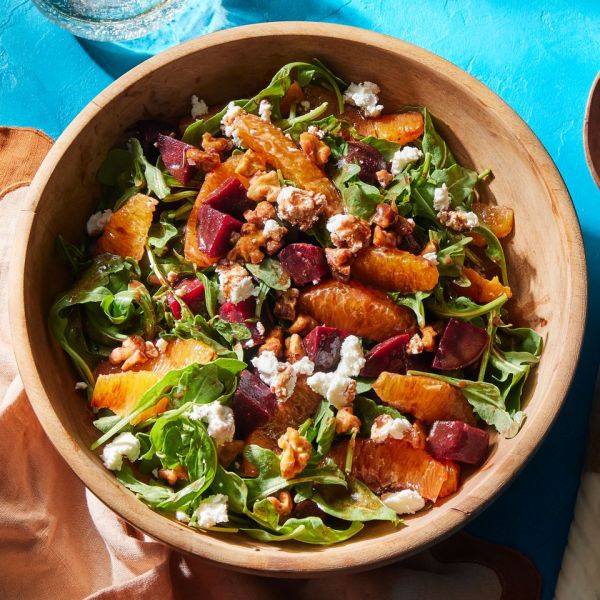 a recipe photo of the Beet Salad with Goat Cheese & Balsamic Vinaigrette Credit: Photographer: Rachel Marek, Food stylist: Holly Dreesman, Prop stylist: Addelyn Evans