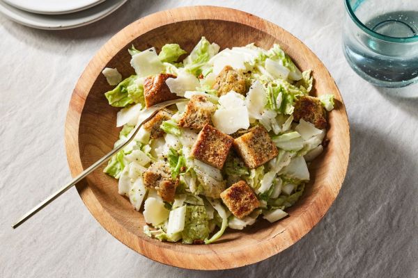 a recipe photo of the Cabbage Caesar Salad Credit: Photography: Rachel Marek, Food stylist: Kelsey Moylan, Prop stylist: Gabriel Greco
