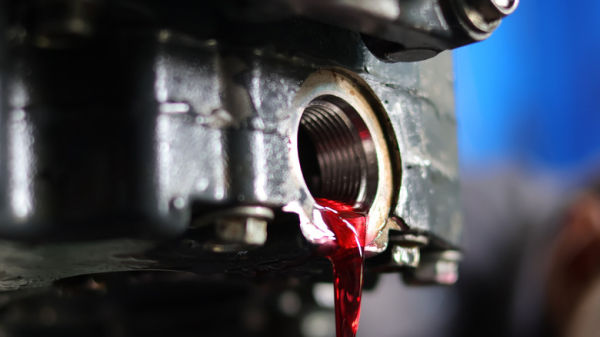 Automatic transmission fluid draining out of an open drain plug