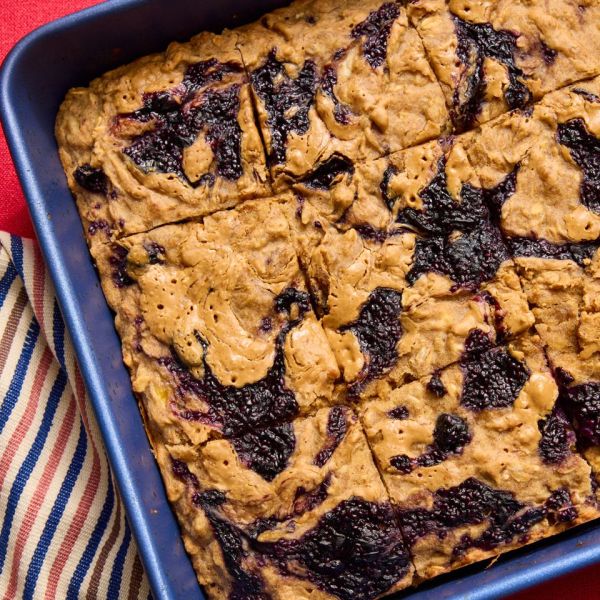 A recipe image of High-Protein Peanut Butter-Blueberry Oatmeal Bars Credit: Photographer: Stacy K. Allen, Prop Stylist: Keoshia McGhee, Food Stylist: Amanda Holstein.