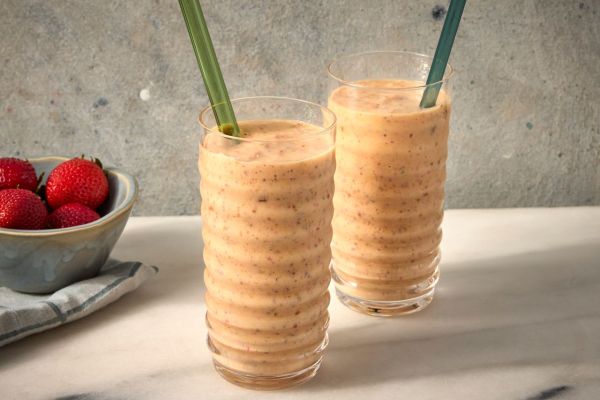 A recipe image of Strawberry-Mango Chia Seed Smoothie Credit: Photographer: Jen Causey, Food Stylist: Jennifer Wendorf, Prop Stylist: Josh Hoggle.