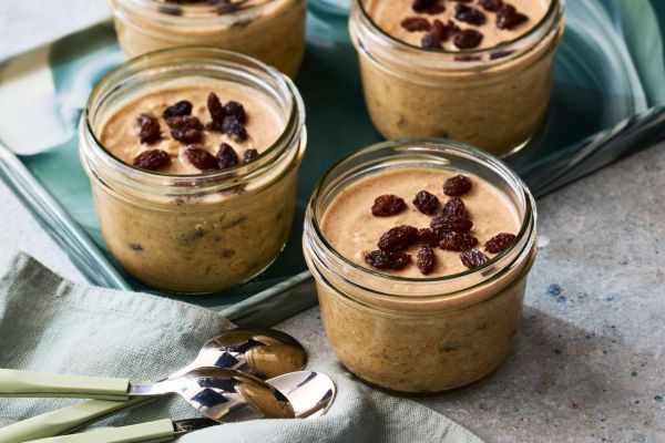 A recipe image of No-Added-Sugar Cinnamon-Raisin Overnight Oats. Credit: Photographer: Greg Dupree, Food Stylist: Chelsea Zimmer, Prop Stylist: Christina Daley.