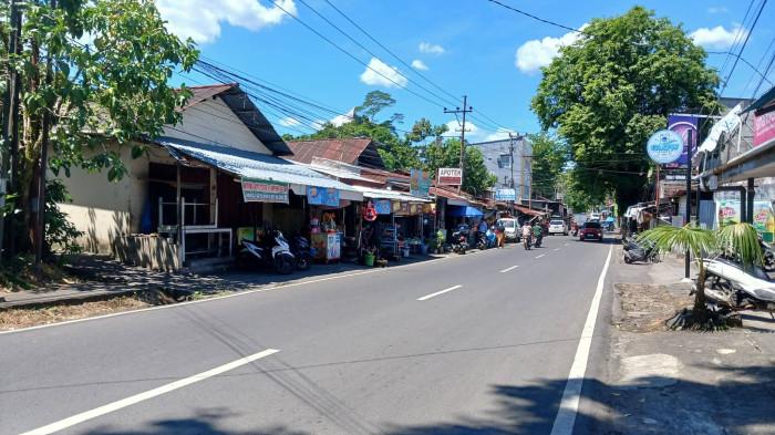 JALANAN - Suasana di Kelurahan Perkamil, Kecamatan Paal Dua, Kota Manado, Sulawesi Utara, Senin (6/7/2026). Berikut harapan warga menjelang HUT ke-403 Kota Manado.