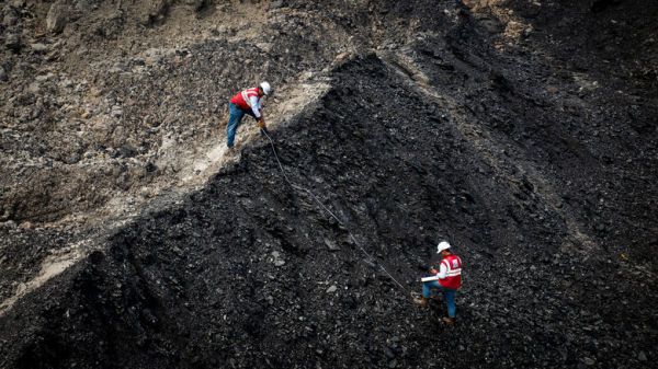 Workers at a coal mine in Indonesia