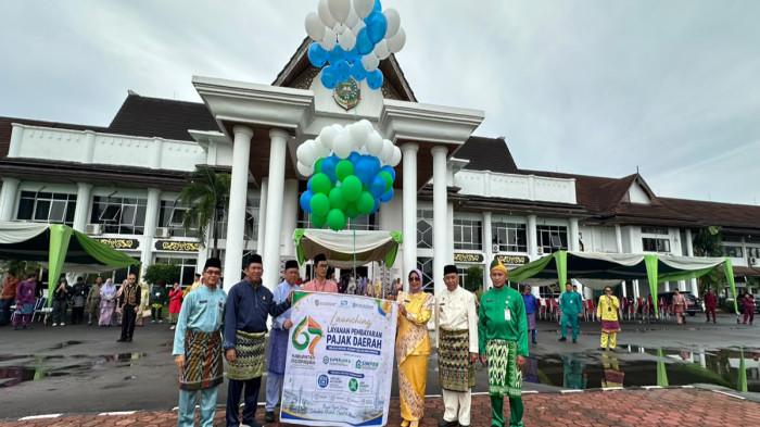 HUT MEMPAWAH - Pemerintah Kabupaten Mempawah memperingati Hari Jadi ke-67 Kabupaten Mempawah dengan menggelar upacara dan rangkaian kegiatan yang berlangsung khidmat, Senin, 6 Juli 2026.