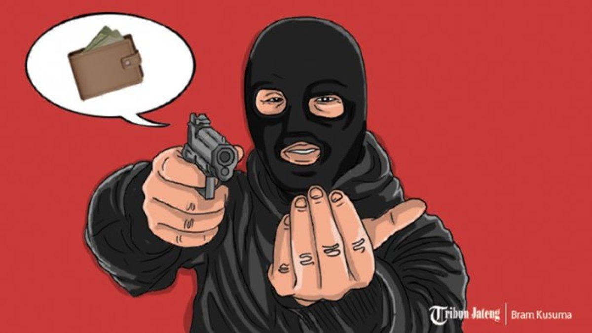 ILUSTRASI perampokan menggunakan senjata pistol