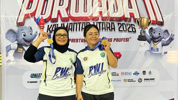 Pasangan Norjannah dan Rika Natalia (kanan)