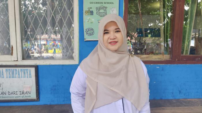 Kepala SD Negeri 157 Palembang, Fadhillah Aisyah, S.Pd., Gr., M.M.,