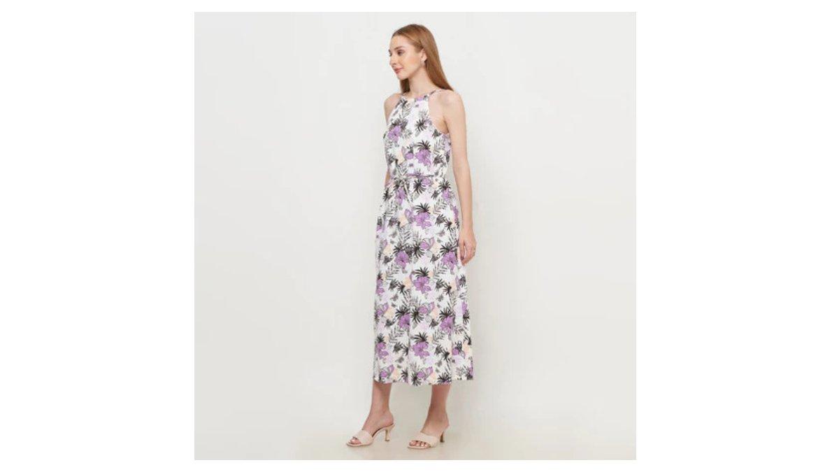 Ilustrasi rekomendasi Maxi Dress Floral untuk dipakai liburan