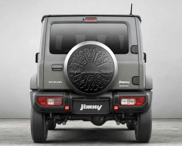 Rear view of a gray Suzuki Jimny with a spare tire cover featuring a snowflake design and