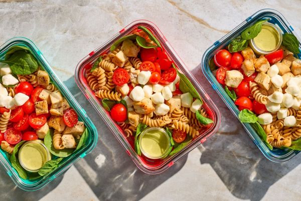 A recipe image of Chicken Caprese Pasta Salad Bowls. Credit: Photographer: Jake Sternquist, Food Stylist: Annie Probst, Prop Stylist: Gabriel Greco.