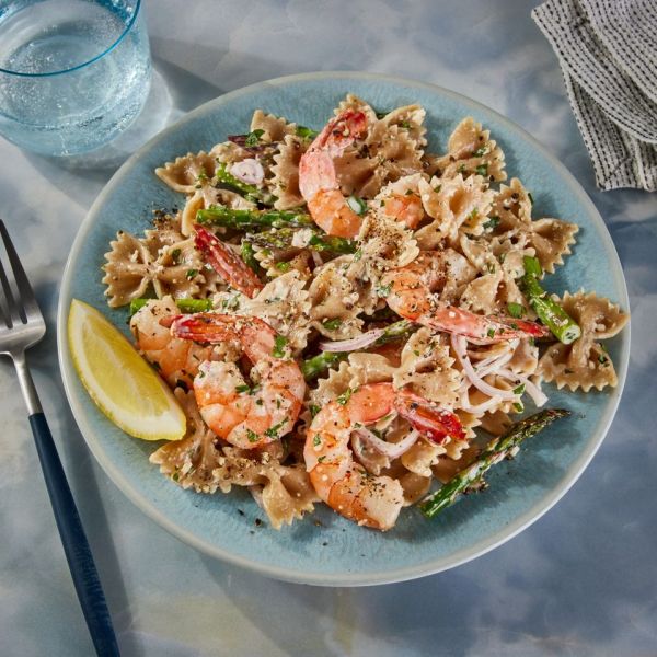 Shrimp Pasta Salad on a plate Credit: Photographer: Jen Causey, Food Stylist: Chelsea Zimmer, Prop Stylist: Lydia Purcell