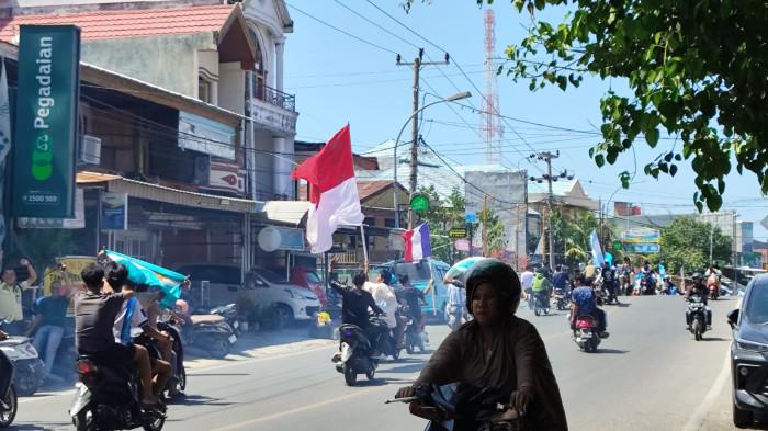 KONVOI - Fsans Argentina di Majene, Sulawesi Barat konvoi di jalan raya usai laga Argentina vs Swiss yang dimenangkan Argentina dengan skor telak 3-1, Minggu (21/7/2026).