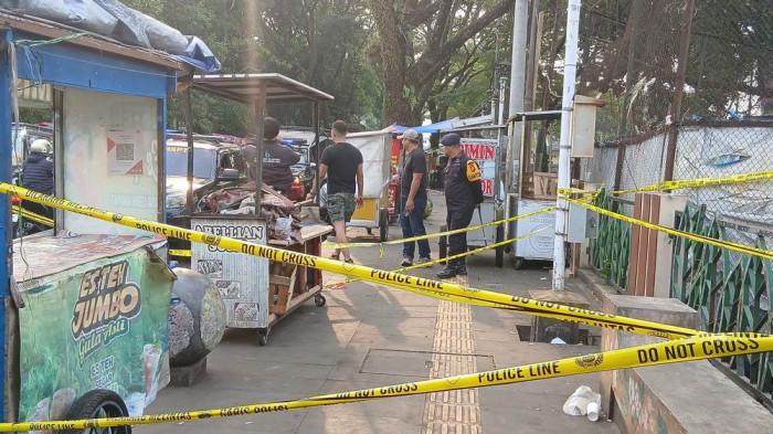 TKP - Lokasi kejadian cekcok pedagang yang berujung ledakan di kawasan Kompleks Dadaha, Kota Tasikmalaya, Minggu (12/7/2026). Kejadian adu mulut pedagang terjadi pada Sabtu (11/7/2026).