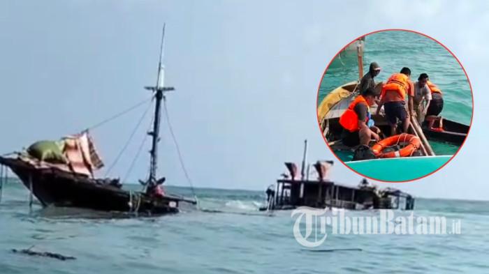 KAPAL TENGGELAM - Sebuah kapal bermuatan barang dilaporkan tenggelam di perairan Laut Lansik, Desa Belungkur, Kecamatan Lingga Timur, Kabupaten Lingga, Kepulauan Riau, Minggu (12/7/2026). Lima dari 20 ABK pilih tetap bertahan di kapal yang nyaris seluruhnya tenggelam, menunggu kapal penjemput dan menolak dievakuasi warga setempat.