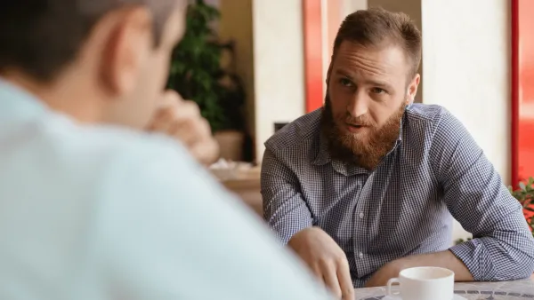 mentally and emotionally stable man in deep conversation with friend