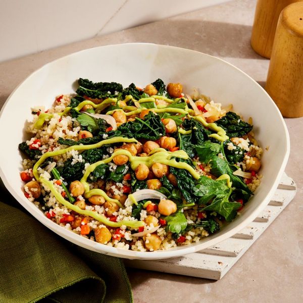 a recipe photo of the Kale and Chickpea Grain Bowl w Avocado Dressing Credit: Photographer: Jen Causey, Food Stylist: Ruth Blackburn, Prop Stylist: Shell Royster