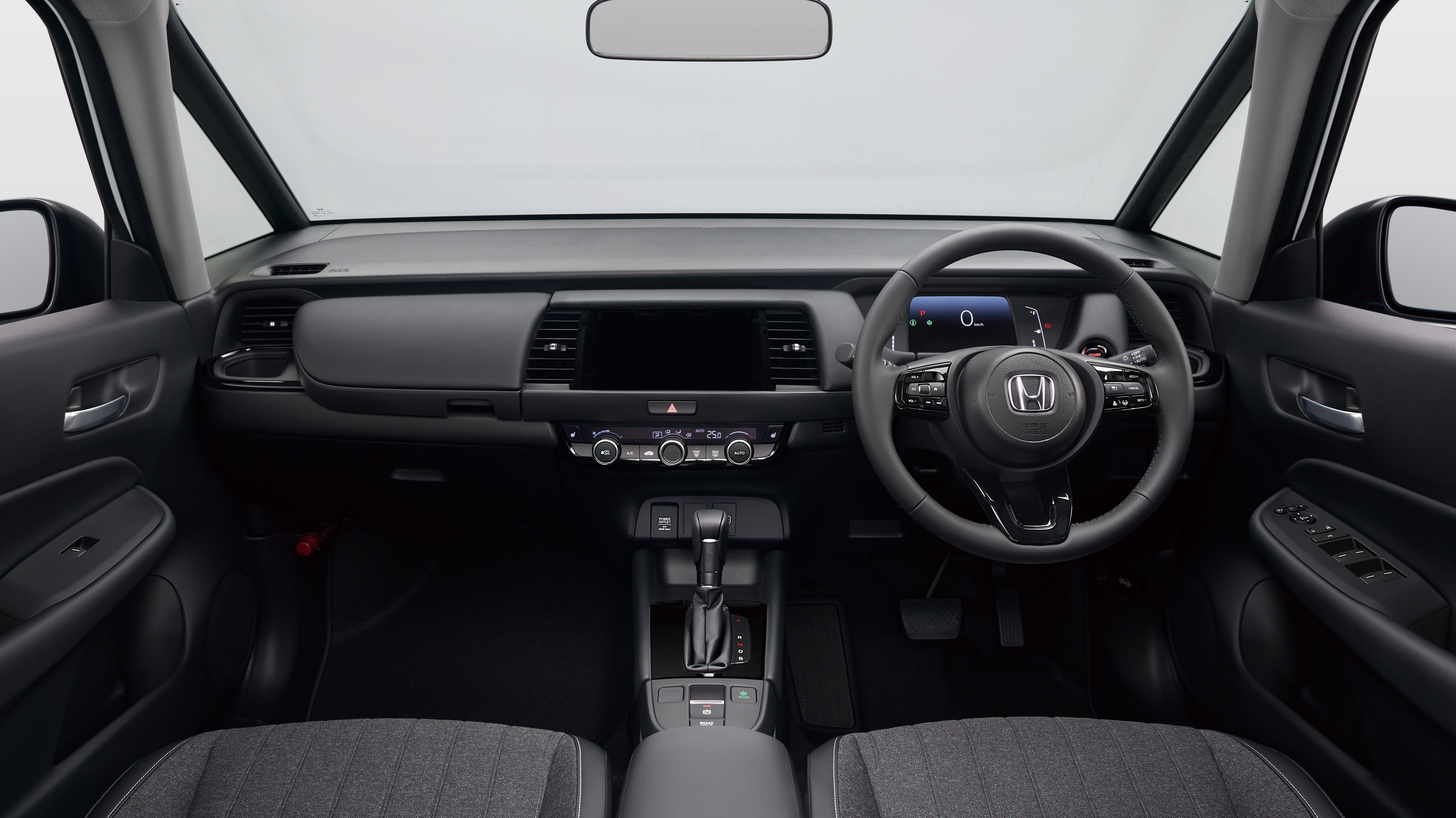 Interior view of Honda Fit dashboard and steering wheel, dated 2026.07.09.
