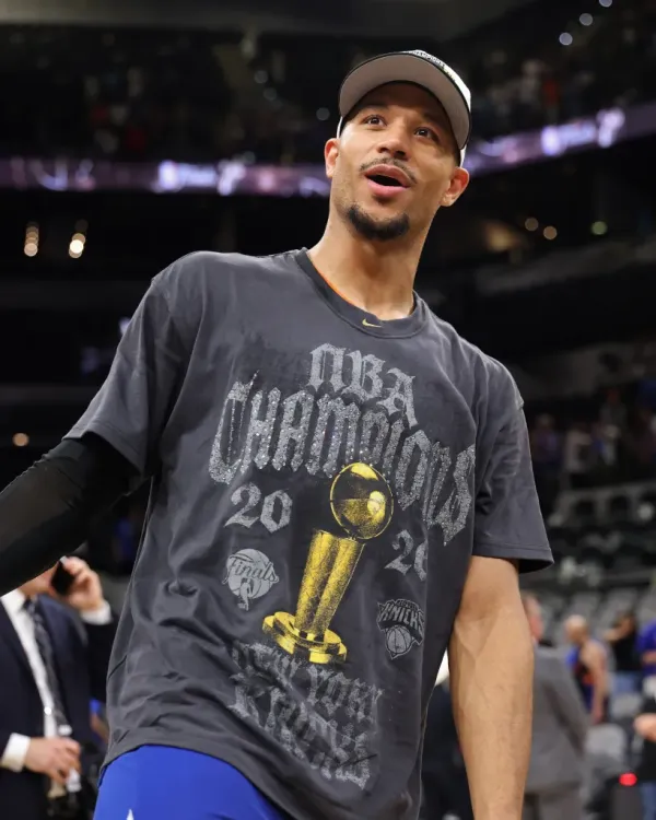 Josh Hart #3 of the New York Knicks celebrates after winning the NBA Finals.