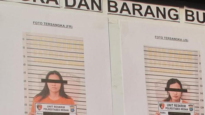 KASUS PEMERASAN - Penampakan foto dua tersangka, inisial FR (31) dan JD (29), saat polisi menggelar konferensi pers di Polrestabes Medan pada Rabu (15/7/2026).
