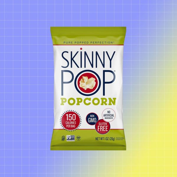 A bag of Skinny Pop Popcorn displayed against a gradient background Credit: Dollar General. EatingWell design.