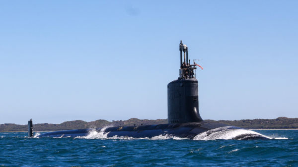 USS Minnesota submarine on ocean surface off the coast of Australia.