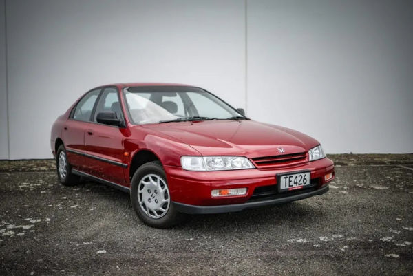 1995 Honda Accord LXi red sedan front three-quarter view