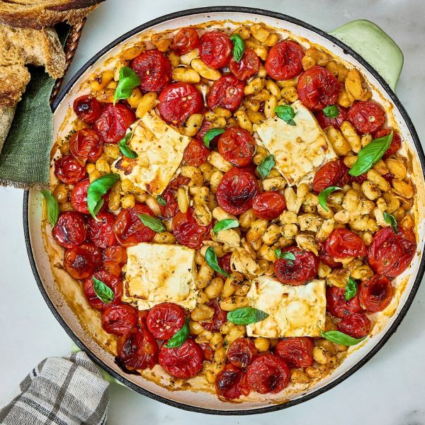 Recipe image of Baked Feta, Tomato & White Bean Skillet. Credit: Photographer: Brittney Cottrell, Food stylist: Marianne Williams, Prop Stylist: Josh Hoggle