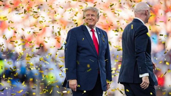 Donald Trump refuses to leave podium in awkward moment as Spain lift World Cup
