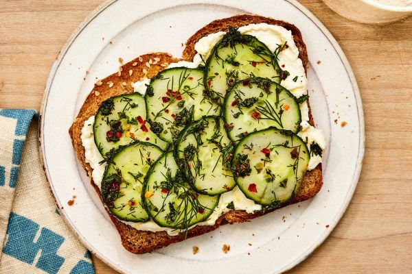 a recipe photo of the Cucumber Toast Credit: Photographer: Morgan Hunt Glaze, Food Stylist: Margaret Monroe Dickey, Prop Stylist: Julia Bayless