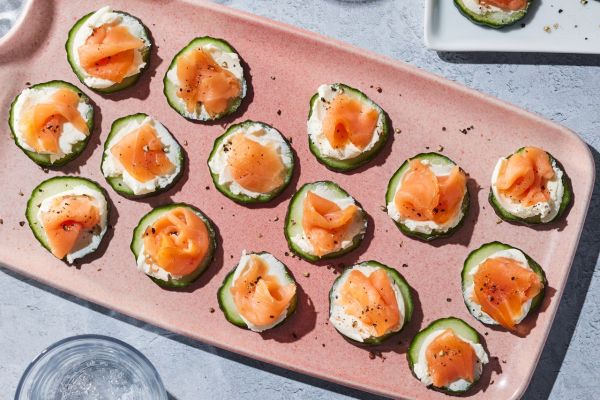 a recipe photo of the Cucumber Salmon Bites Credit: Photographer: Brie Goldman, Food Stylist: Lauren McAnelly, Prop Stylist: Gabriel Greco
