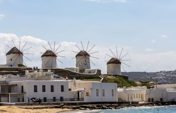 Scenic view. Famous Mykonos town windmills. Traditional Greek windmills on Mykonos island, Greece