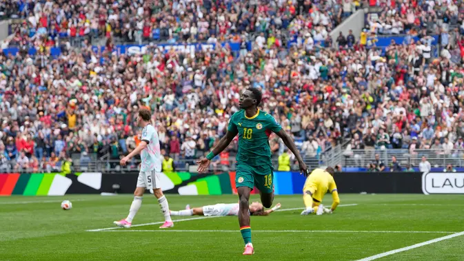 Pemain Senegal Ismaila Sarr (18) berselebrasi setelah mencetak gol kedua dalam laga babak 32 besar Piala Dunia 2026 antara Belgia vs Senegal di Seattle, Rabu, 1 Juli 2026. (AP Photo/Lindsey Wasson)