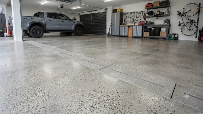 Tempat Cuci Motor dengan Saluran Drainase Tersembunyi. (AI Generated)