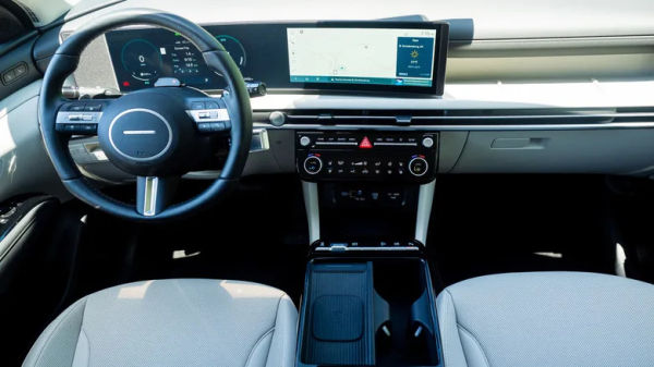 2026 Hyundai Tucson Hybrid dashboard, steering wheel and digital displays