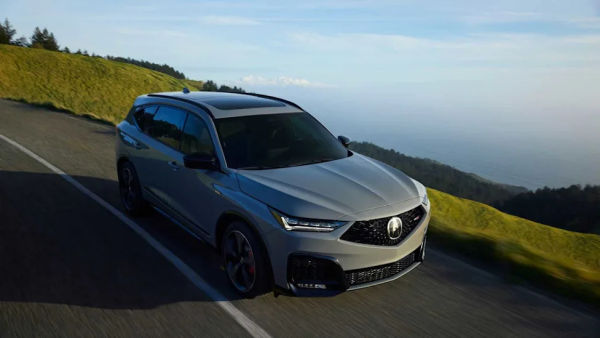 Dynamic front 3/4 shot of a gray 2025 Acura MDX Type S.
