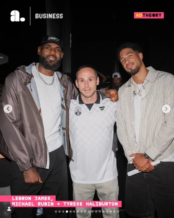 LeBron James, Michael Rubin, and Tyrese Haliburton posing together.