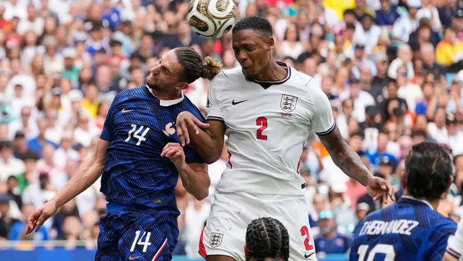 Pemain Inggris Ezri Konsa mencetak gol kedua timnya dari tendangan sudut selama pertandingan sepak bola perebutan tempat ketiga Piala Dunia antara Prancis dan Inggris di Miami Gardens, Florida, Sabtu, 18 Juli 2026. (AP Photo/Rebecca Blackwell)
