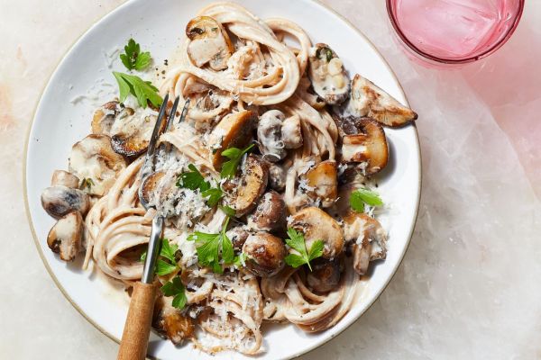 Linguine with Creamy Mushroom Sauce on a plate with a fork Credit: Brie Passano