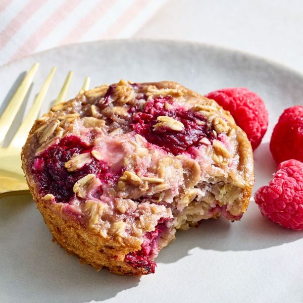 A recipe image of Breakfast Lemon, Raspberry & Cream Cheese Oatmeal Cakes. Credit: Photographer: Jake Sternquist, Food Stylist: Shannon Goforth, Prop Stylist: Gabriel Greco